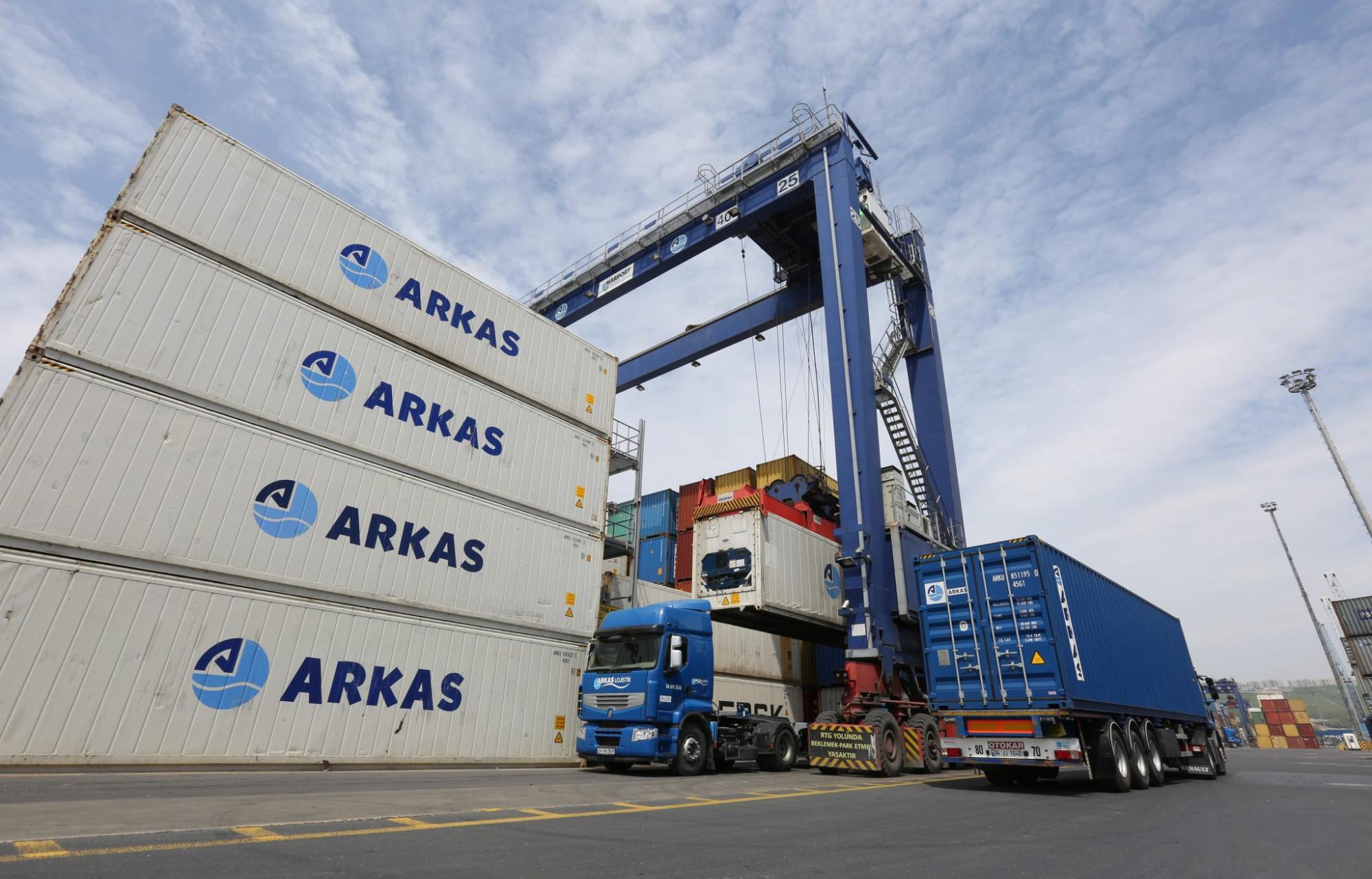 Arkas Containers Being Loaded onto Trucks at the Port Terminal